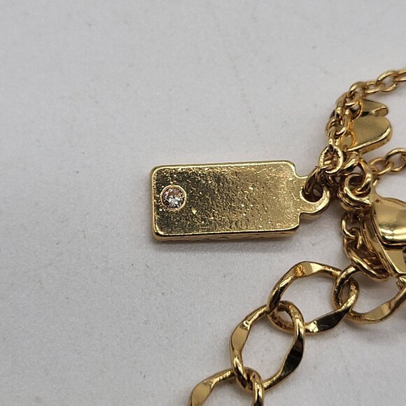 Kate Spade New York Hole Punch Cut out Gold Tone Long Necklace - Picture 10 of 12